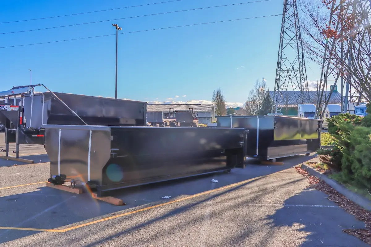Roll-off dumpster ready for waste disposal at job site for 2 Yard Dumpster Rental in Knightdale